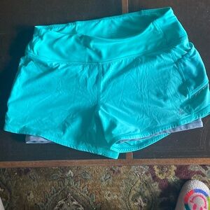 Athleta lined green shorts S